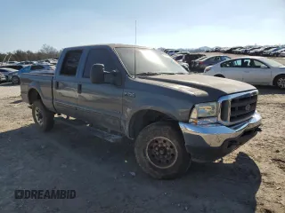 2002 Ford F-250 XL with VIN 3FTNW20F92MA15309, listed as a Copart auction lot 43750155 with 233,290 mi miles and Salvage Title. Bid and sale history available at DreamBid. Image 4.