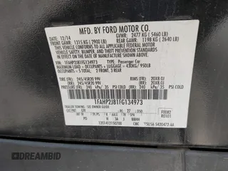 2015 Ford Taurus Limited with VIN 1FAHP2J81FG134973, listed as a IAAI auction lot 41845384 with 139,203 mi miles. Bid and sale history available at carsss.com. Image 9.