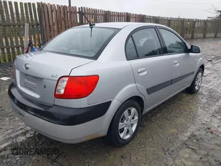 2009 Kia Rio SX with VIN KNADE223596538965, listed as a IAAI auction lot 42029409 with 143,794 mi miles. Bid and sale history available at carsss.com. Image 4.
