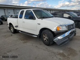 2003 Ford F-150 XL with VIN 1FTRX07243KA29505, listed as a Copart auction lot 79263674 with 188,516 mi miles and Salvage Title. Bid and sale history available at carsss.com. Image 4.
