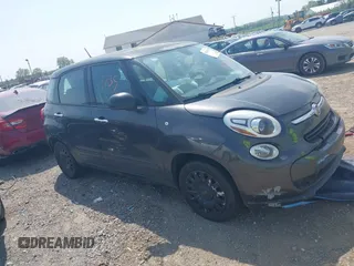2014 FIAT 500L Pop z VIN ZFBCFAAHXEZ016833, wystawiony jako IAAI lot #42161735 z przebiegiem 137 580 mil mil oraz . Historia ofert i sprzedaży dostępna na DreamBid. Obrazek 1.