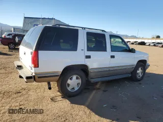 1999 GMC Denali z VIN 1GKEK13R5XR503159, wystawiony jako Copart lot #89018655 z przebiegiem 229 819 mil mil oraz Czysty tytuł • Clean title. Historia ofert i sprzedaży dostępna na DreamBid. Obrazek 3.