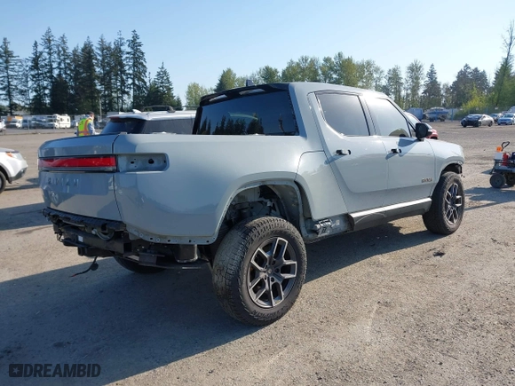 2022 Rivian R1T Adventure Package with VIN 7FCTGAAA5NN007018, listed as a IAAI auction lot 42018939 with 41,991 mi miles. Bid and sale history available at carsss.com. Image 4.