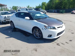 2011 Scion tC z VIN JTKJF5C73B3013201, wystawiony jako IAAI lot #42137431 z przebiegiem 157 352 mil mil oraz . Historia ofert i sprzedaży dostępna na DreamBid. Obrazek 1.