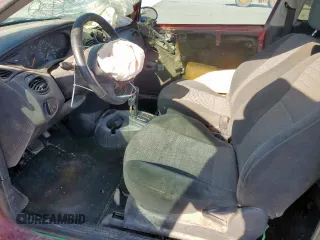 2000 Ford Focus ZX3 with VIN 3FAFP313XYR101516, listed as a Copart auction lot 51911325 with 180,653 mi miles and Salvage title. Bid and sale history available at DreamBid. Image 7.
