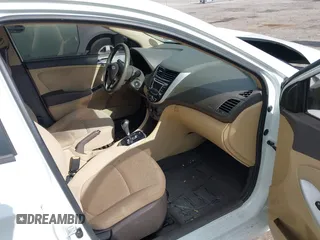 2014 Hyundai Accent GLS with VIN KMHCU4AE8EU608539, listed as a IAAI auction lot 41946784 with 106,709 mi miles and . Bid and sale history available at carsss.com. Image 5.