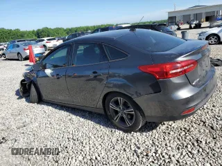 2016 Ford Focus SE with VIN 1FADP3FE8GL381855, listed as a Copart auction lot 57366645 with 104,709 mi miles and Salvage title. Bid and sale history available at DreamBid. Image 2.
