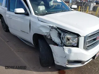 2015 GMC Yukon XL SLT with VIN 1GKS1HKC2FR612690, listed as a IAAI auction lot 41234188 with 113,830 mi miles. Bid and sale history available at carsss.com. Image 6.