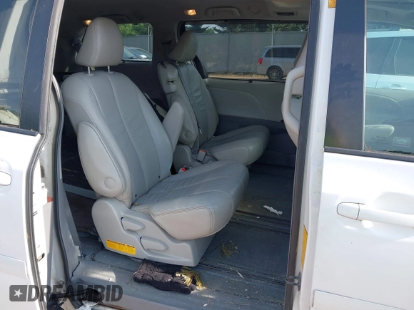 2011 Toyota Sienna XLE AAS with VIN 5TDYK3DC1BS026108, listed as a IAAI auction lot 42681177 with 201,873 mi miles and . Bid and sale history available at DreamBid. Image 8.
