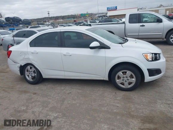 2014 Chevrolet Sonic LS z VIN 1G1JA5SH9E4180377, wystawiony jako IAAI lot #41839198 z przebiegiem 156 357 mil mil oraz . Historia ofert i sprzedaży dostępna na DreamBid. Obrazek 13.