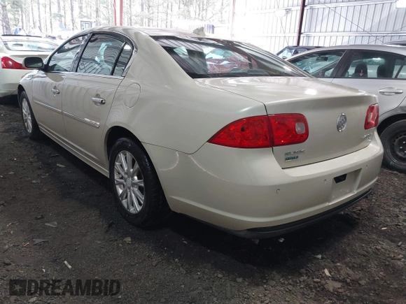 2011 Buick Lucerne CXL with VIN 1G4HC5EM4BU127554, listed as a IAAI auction lot 41879979 with 102,588 mi miles and . Bid and sale history available at DreamBid. Image 3.