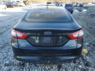 2015 Ford Fusion SE Hybrid с VIN 3FA6P0LU7FR228189, выставлен на аукционе Copart как лот 79744174 с пробегом Не указан миль и Списание • Salvage title. История ставок и продаж доступна на DreamBid. Изображение 6.