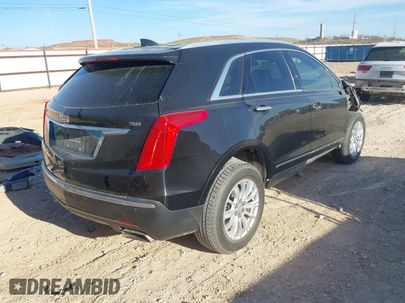 2018 Cadillac XT5 FWD with VIN 1GYKNARS3JZ104087, listed as a IAAI auction lot 41586765 with 137,369 mi miles. Bid and sale history available at carsss.com. Image 4.
