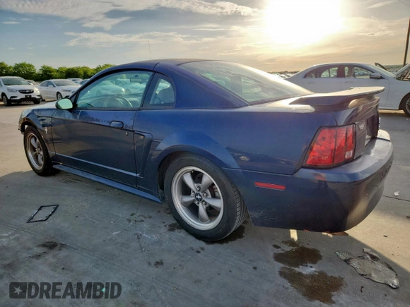 2001 Ford Mustang Standard with VIN 1FAFP40421F247069, listed as a Copart auction lot 61634675 with 133,681 mi miles and Salvage title. Bid and sale history available at DreamBid. Image 2.