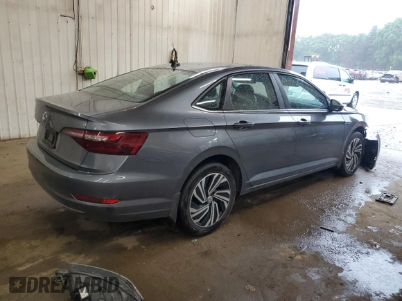 2021 Volkswagen Jetta SEL with VIN 3VWE57BU1MM089075, listed as a Copart auction lot 61463625 with 76,237 mi miles and Salvage title. Bid and sale history available at DreamBid. Image 3.