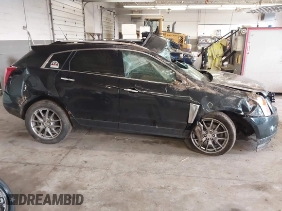 2014 Cadillac SRX Premium Collection with VIN 3GYFNGE35ES636852, listed as a IAAI auction lot 42283604 with 167,983 mi miles and . Bid and sale history available at DreamBid. Image 14.