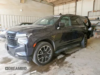 2023 Chevrolet Tahoe RST with VIN 1GNSCRKD5PR290351, listed as a Copart auction lot 58806595 with 64,909 mi miles and Salvage title. Bid and sale history available at DreamBid. Image 1.