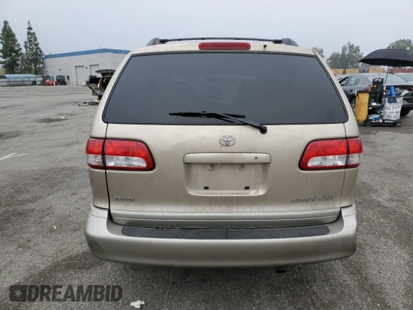 2001 Toyota Sienna LE with VIN 4T3ZF13C01U333507, listed as a Copart auction lot 86604984 with 192,377 mi miles and Salvage Title. Bid and sale history available at DreamBid. Image 6.