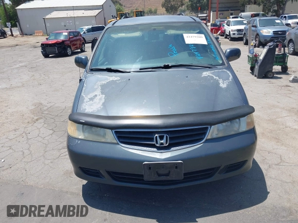 2003 Honda Odyssey EX z VIN 5FNRL18683B097760, wystawiony jako IAAI lot #42479209 z przebiegiem 126 470 mil mil oraz . Historia ofert i sprzedaży dostępna na DreamBid. Obrazek 6.