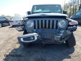 2022 Jeep Wrangler Unlimited Sahara with VIN 1C4HJXEM7NW206585, listed as a IAAI auction lot 42102516 with 10,769 mi miles and . Bid and sale history available at DreamBid. Image 21.