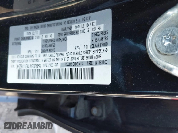 2018 Mazda 3 Touring with VIN 3MZBN1V34JM208669, listed as a IAAI auction lot 41834164 with 117,639 mi miles. Bid and sale history available at carsss.com. Image 9.