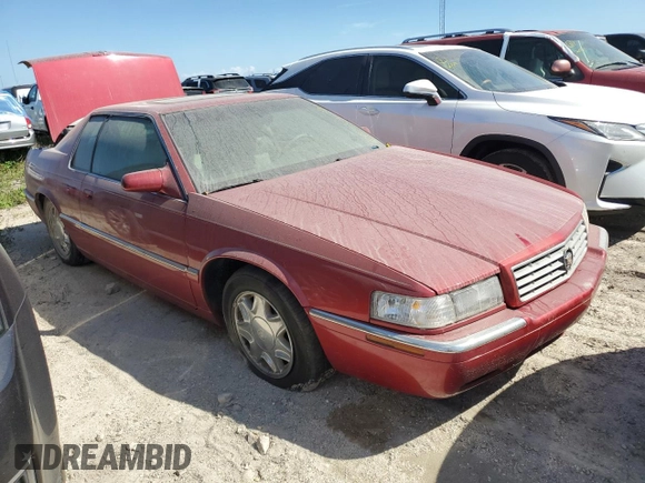 2000 Cadillac Eldorado z VIN 1G6EL12Y7YU198685, wystawiony jako Copart lot #75093094 z przebiegiem Nie podano mil oraz Szkoda całkowita • Salvage title. Historia ofert i sprzedaży dostępna na DreamBid. Obrazek 4.