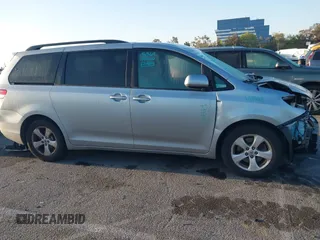 2014 Toyota Sienna LE AAS with VIN 5TDKK3DC1ES520561, listed as a IAAI auction lot 41959565 with 115,908 mi miles and . Bid and sale history available at carsss.com. Image 14.