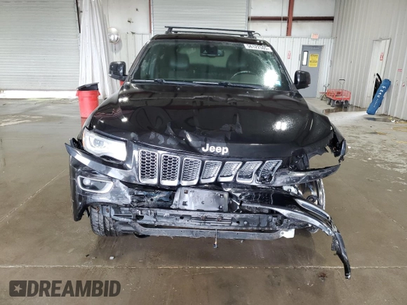 2015 Jeep Grand Cherokee Summit with VIN 1C4RJFJG0FC685241, listed as a Copart auction lot 56122505 with 112,516 mi miles and Salvage title. Bid and sale history available at DreamBid. Image 5.