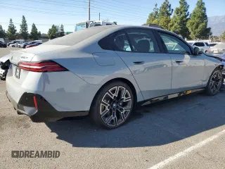 2024 BMW i5 eDrive40 with VIN WBY33FK01RCN99702, listed as a Copart auction lot 78737934 with 11,889 mi miles and Salvage Title. Bid and sale history available at carsss.com. Image 3.
