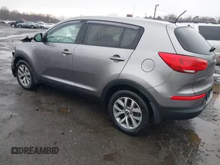 2014 Kia Sportage LX with VIN KNDPBCAC0E7601636, listed as a IAAI auction lot 41832978 with 145,353 mi miles and . Bid and sale history available at carsss.com. Image 3.