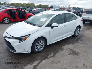 2023 Toyota Corolla Hybrid LE with VIN JTDBCMFE2P3007101, listed as a IAAI auction lot 40799086 with 13,974 mi miles. Bid and sale history available at carsss.com. Image 2.