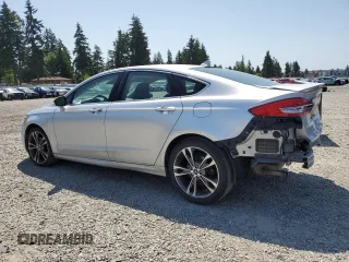 2019 Ford Fusion Titanium with VIN 3FA6P0K90KR271280, listed as a Copart auction lot 59572085 with 137,362 mi miles and Clean title. Bid and sale history available at DreamBid. Image 2.