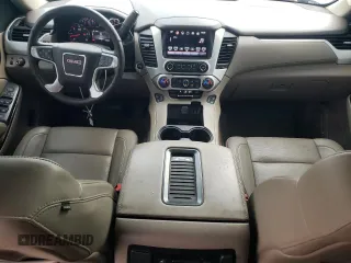 2016 GMC Yukon SLT with VIN 1GKS2BKC0GR265761, listed as a Copart auction lot 65645484 with 130,352 mi miles and Salvage Title. Bid and sale history available at carsss.com. Image 8.