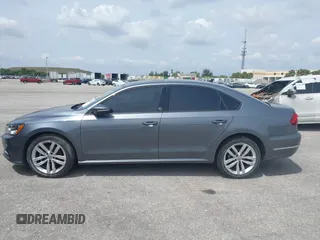 2019 Volkswagen Passat 2.0T Wolfsburg Edition with VIN 1VWLA7A35KC011084, listed as a IAAI auction lot 40385111 with 81,119 mi miles. Bid and sale history available at carsss.com. Image 14.