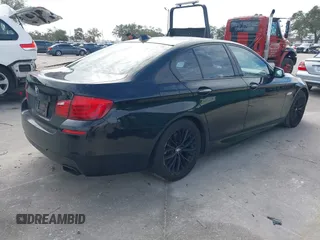 2013 BMW 5 Series 550i xDrive with VIN WBAFU9C56DDY70485, listed as a IAAI auction lot 41276612 with 116,452 mi miles and . Bid and sale history available at carsss.com. Image 4.