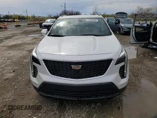 2019 Cadillac XT4 FWD Sport z VIN 1GYFZER48KF112347, wystawiony jako Copart lot #51124995 z przebiegiem 60 811 mil mil oraz Szkoda całkowita • Salvage title. Historia ofert i sprzedaży dostępna na DreamBid. Obrazek 5.