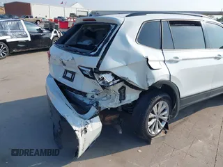 2018 Volkswagen Tiguan S with VIN 3VV1B7AX1JM119971, listed as a IAAI auction lot 42039977 with 108,932 mi miles and . Bid and sale history available at DreamBid. Image 6.