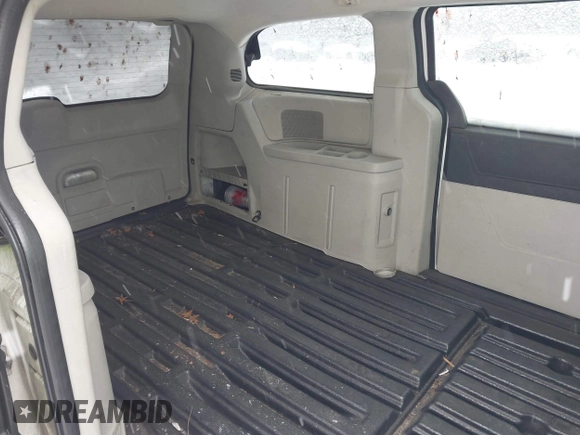 2009 Dodge Grand Caravan with VIN 2D8HN11E19R703857, listed as a IAAI auction lot 41195565 with 199,776 mi miles and . Bid and sale history available at DreamBid. Image 8.