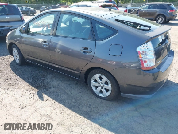 2007 Toyota Prius z VIN JTDKB20U473225645, wystawiony jako IAAI lot #42409516 z przebiegiem 154 050 mil mil oraz . Historia ofert i sprzedaży dostępna na DreamBid. Obrazek 3.