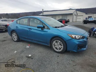 2017 Subaru Impreza Premium with VIN 4S3GKAD62H3606634, listed as a Copart auction lot 51037715 with 100,346 mi miles and Salvage title. Bid and sale history available at DreamBid. Image 4.