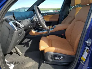 2024 BMW X5 M60i with VIN 5UX33EU07R9U78919, listed as a Copart auction lot 70676234 with 14,301 mi miles and Salvage Title. Bid and sale history available at carsss.com. Image 7.