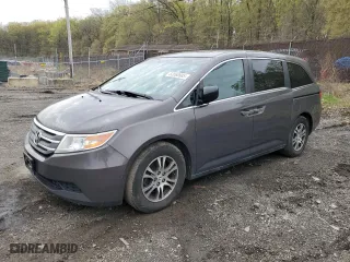 2012 Honda Odyssey EX-L with VIN 5FNRL5H62CB079729, listed as a Copart auction lot 52068685 with 181,468 mi miles and Salvage Title. Bid and sale history available at carsss.com. Image 1.