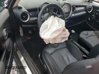 2011 MINI Hardtop S with VIN WMWSV3C55BTY20530, listed as a Copart auction lot 56016985 with Not Provided miles and Salvage Title. Bid and sale history available at DreamBid. Image 8.
