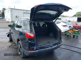 2021 Chevrolet Equinox LT with VIN 2GNAXUEV7M6117879, listed as a IAAI auction lot 42687171 with 53,134 mi miles and . Bid and sale history available at DreamBid. Image 3.