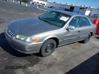 2000 Toyota Camry CE with VIN 4T1BG22K3YU643229, listed as a IAAI auction lot 42162845 with 142,457 mi miles and . Bid and sale history available at carsss.com. Image 6.