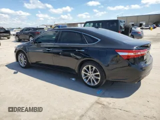 2013 Toyota Avalon XLE with VIN 4T1BK1EB2DU043140, listed as a Copart auction lot 56282625 with 262,725 mi miles and Salvage Title. Bid and sale history available at DreamBid. Image 2.
