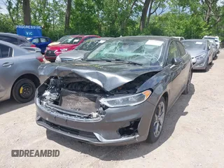 2020 Ford Fusion Titanium with VIN 3FA6P0RUXLR182120, listed as a IAAI auction lot 42351542 with 141,746 mi miles and . Bid and sale history available at DreamBid. Image 2.