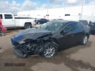 2016 Mazda Mazda6 i Sport with VIN JM1GJ1U56G1422012, listed as a IAAI auction lot 40693636 with 93,094 mi miles. Bid and sale history available at carsss.com. Image 2.