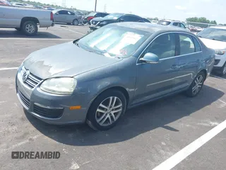 2006 Volkswagen Jetta 1.9L TDI z VIN 3VWST71K66M834544, wystawiony jako IAAI lot #42557527 z przebiegiem Nie podano mil oraz . Historia ofert i sprzedaży dostępna na DreamBid. Obrazek 2.