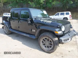2020 Jeep Gladiator Overland with VIN 1C6HJTFG8LL176164, listed as a IAAI auction lot 42482369 with 80,009 mi miles and . Bid and sale history available at DreamBid. Image 1.